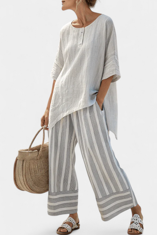 Jane Asymmetric Blouse and Striped Trousers for a Chic Modern Look